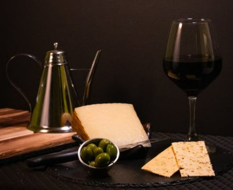 wine and aged cheddar cheese